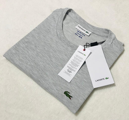 Polo Lacoste cuello redondo manga corta